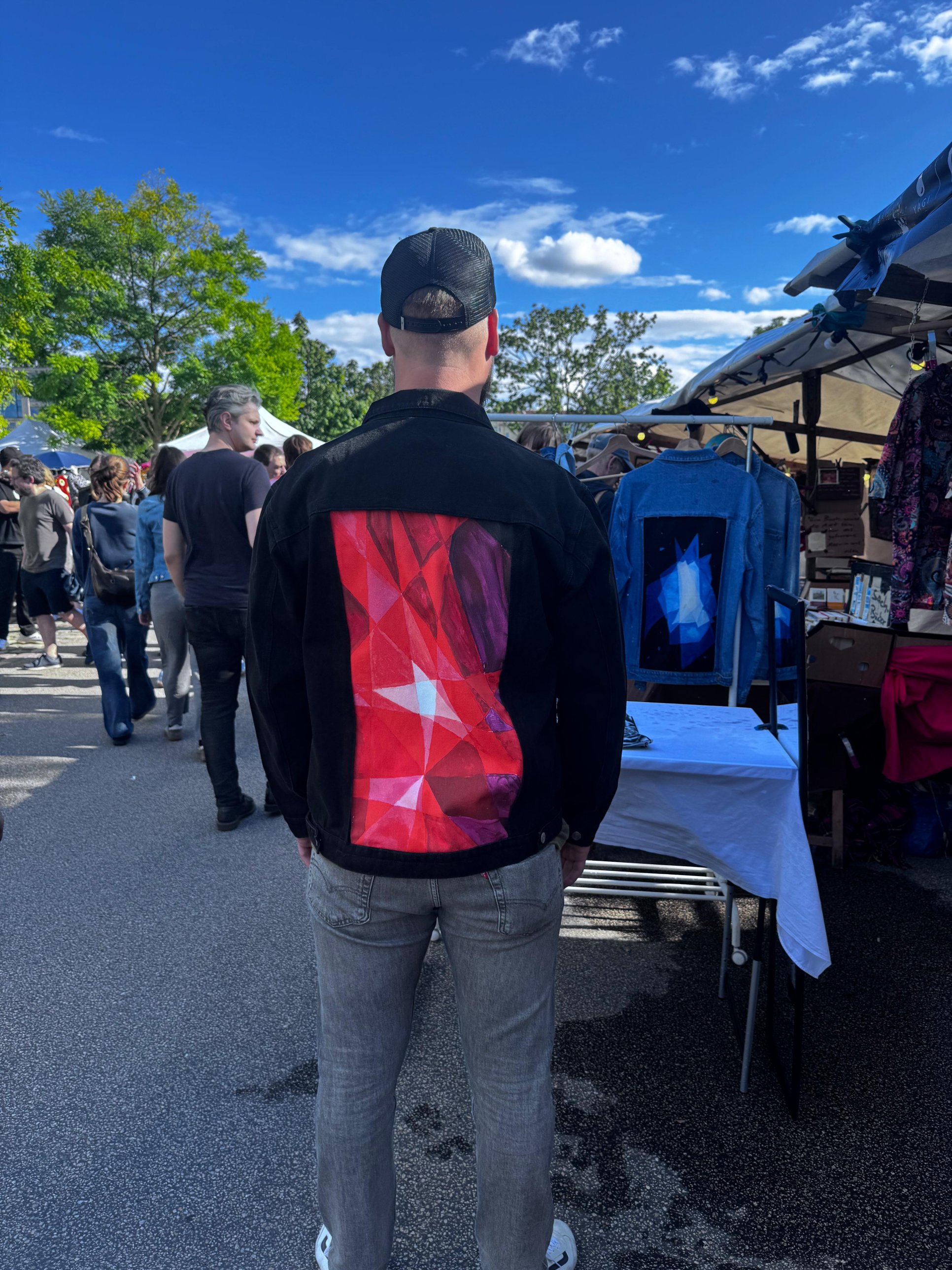 Customer wearing a YAGI jacket, back view with art panel